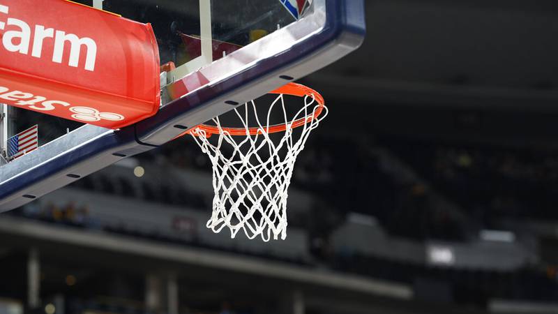 A basketball hoop and net in the first half of an NBA basketball game Thursday, Dec. 23, 2021,...