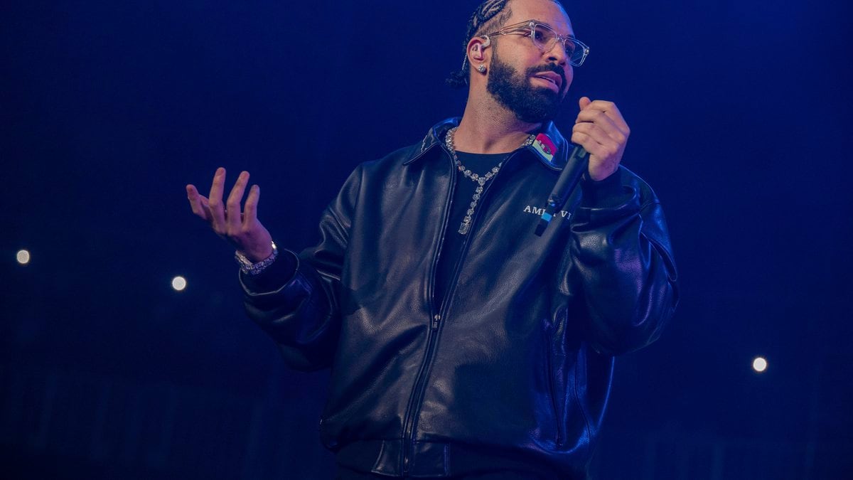 Drake, shown performing in this December 2022 file photo, has postponed his upcoming New...