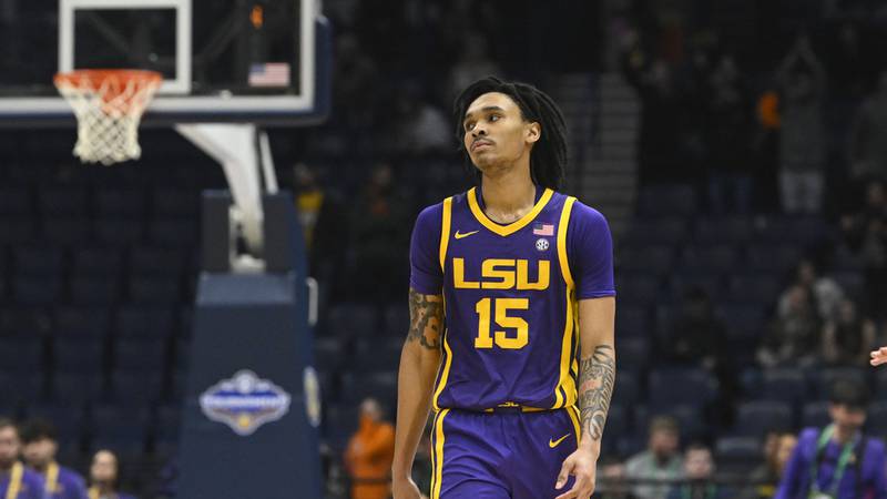 LSU forward Tyrell Ward waits out the closing moments of an NCAA college basketball game...