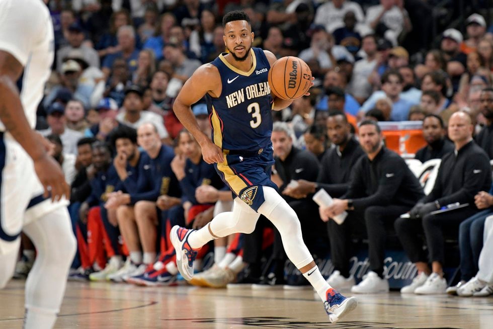 New Orleans Pelicans guard CJ McCollum (3) handles the ball in the first half of an NBA...