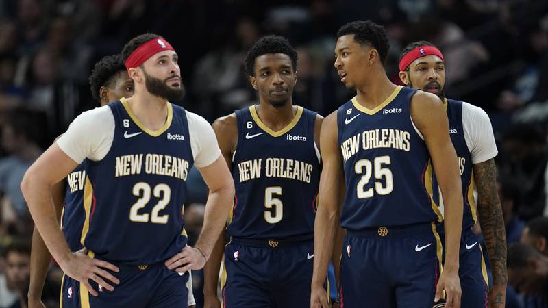 New Orleans Pelicans forward Larry Nance Jr. (22), forward Herbert Jones (5) and guard Trey...